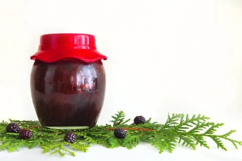 Jar with jam on white background Stock Photos