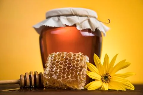 Jar of liquid honey Free Stock Photos