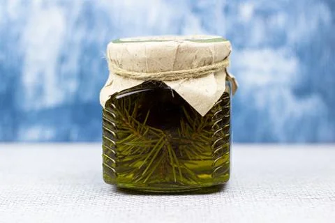 A jar of mint, pine needles and kiwi jam. Stock Photos