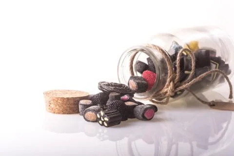 Jar of mixed candy licorice Stock Photos