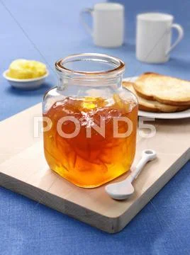 Jar Of Orange Marmalade, Toast And Butter