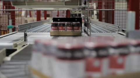 Jar packaging on assembly line in Jam Factory, medium shot Stock Footage 33660902