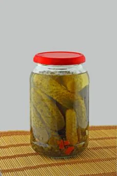 Jar of pickled cucumbers Stock Photos