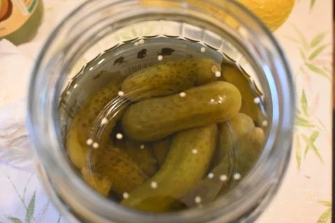 Jar of pickled cucumbers Stock Photos