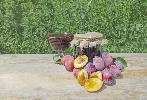 Jar with plum Stock Photos
