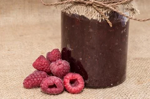 Jar with raspberry jam Foto stock