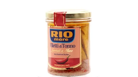 Jar of Rio Mare Tuna Fillets in spicy olive oil and chili pepper Stock Footage 144261072