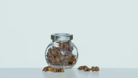 Jar with star anise exploding, Ultra Slow Motion Video stock 86578741