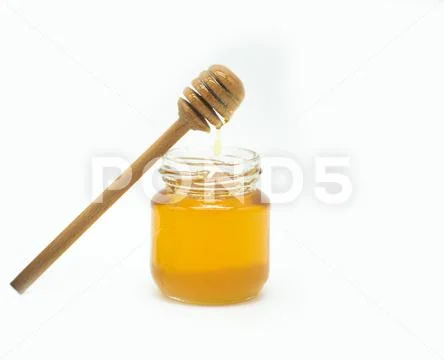 Jar of sweet honey isolate on white background Stock Photos
