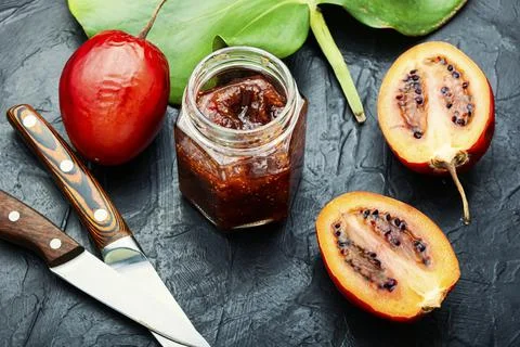Jar of tamarillo jam. Stock Photos
