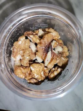 Jar of walnuts Stock Photos