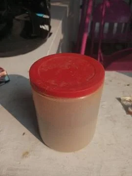 Jar on a white surface Stock Photos