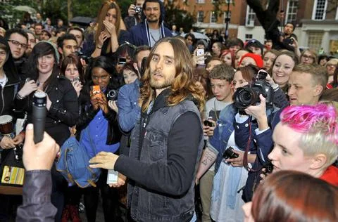  Jared Leto of 30 Seconds To Mars performs at their flash mob gig at Soho ... Stock Photos