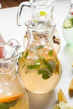 Jars of assorted variety of fresh fruit lemonades Stock Photos