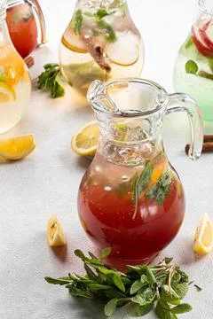 Jars of assorted variety of fresh fruit lemonades Stock Photos