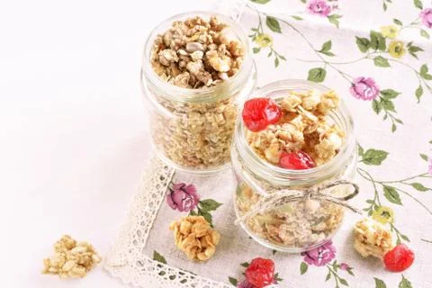 Jars with crispy granola Stock Photos