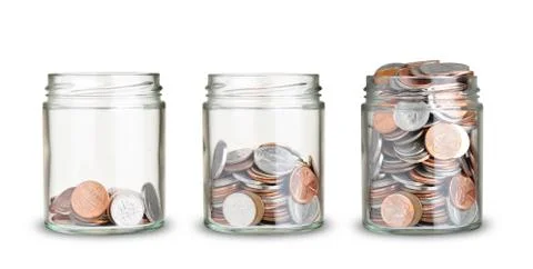Jars with different level of coins isolated on white Stockfoto's