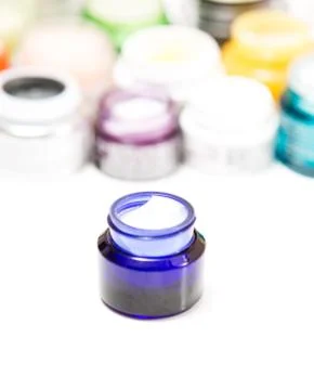 Jars of face cream on white background Foto stock
