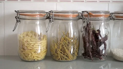 Jars filled with pasta and rice Stock Footage 73405584