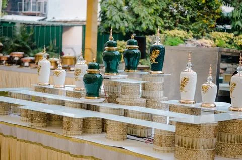 Jars with leaf pattern on a glass table in a market Stock Photos