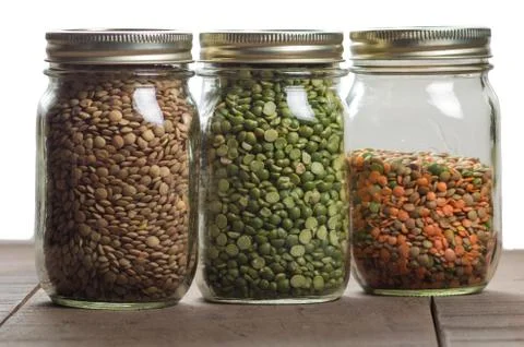 Jars of lentils on a counter Foto stock