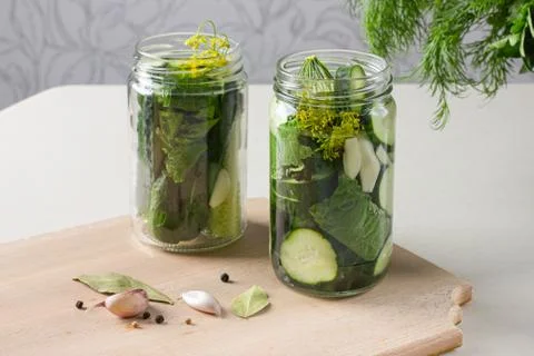 Jars with pickled cucumbers Stock Photos