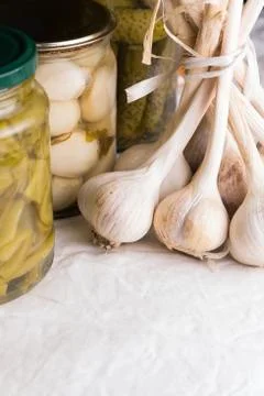 Jars with pickled vegetables on dark background Stock Photos