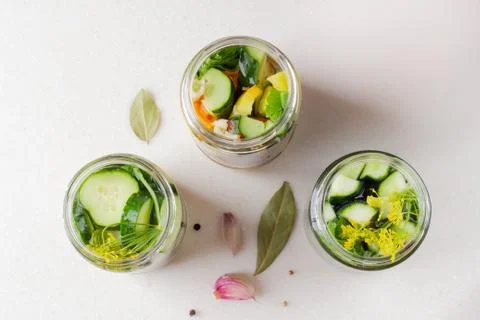 Jars with pickled vegetables. Top view. Stock Photos