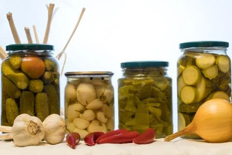 Jars with pickled vegetables on white background Foto stock
