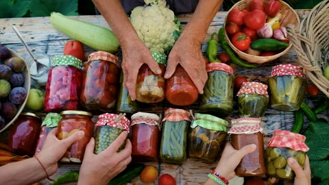 Jars with preserved vegetables for the winter. Selective focus. Stock Footage 204863414