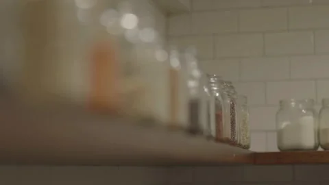Jars on shelf with rack focus 库存影片 336374426