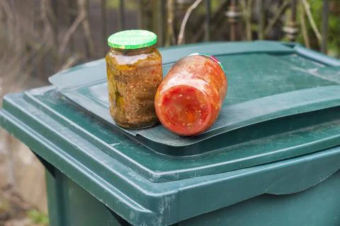 Jars with spoiled vegetables 写真素材