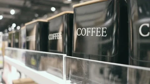 Jars for storage on the store shelf. Coffee storage jars Stock Footage 221511613