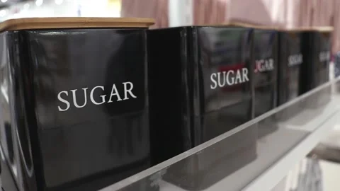 Jars for storage on the store shelf. Sugar storage jars Stock-Footage 229652699