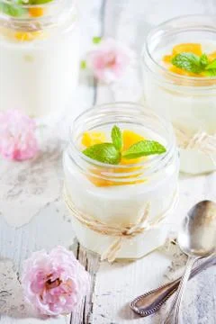 Jars Of Vanilla Pudding With Mango Stock Photos