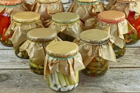 Jars with vegetables arranged Stock Photos