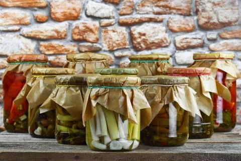 Jars with vegetables arranged Stock Photos