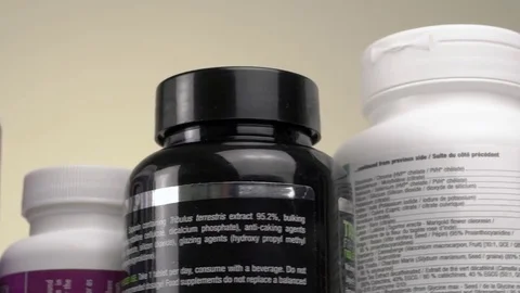Jars with Vitamins and Supplements Closeup Stock Footage 73832387