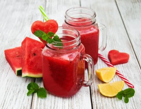 Jars with watermelon smoothie Stock Photos