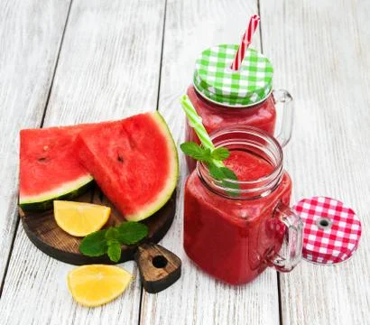 Jars with watermelon smoothie Stock Photos