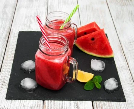 Jars with watermelon smoothie Stock Photos