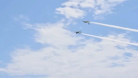 JASDF Blue Impulse demo team Kawasaki T-4's flying inverted and right side up Stock Footage 274536807