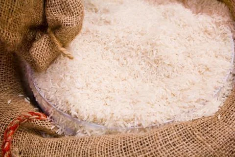 Jasmine rice with texture background Stock Photos