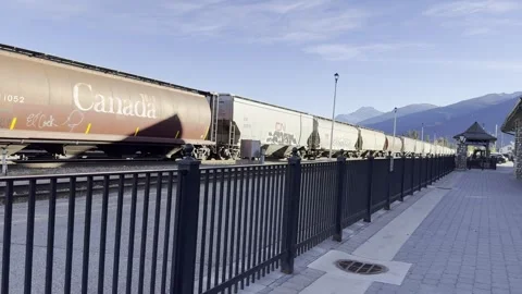 JASPER, ALBERTA, CANADA - OCTOBER 6, 2023 - Freight train cars Canada livery Stock Footage 345452824