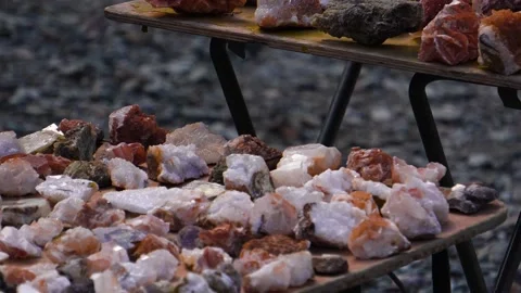 Jasper and calcite specimens in macro texture on wooden board Stock Footage 315867964