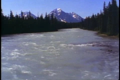 Jasper National Park, Alberta, Canada, mountains, rushing river Stock Footage