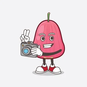 Java Apple cartoon mascot character as photographer in action with a camera Ilustración de archivo