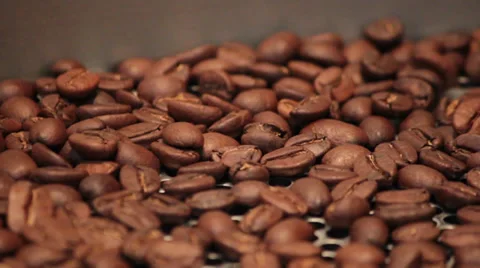 Java: Closeup of Lightly Roasted Coffee Beans in Cooling Spin Stock Footage 37256435