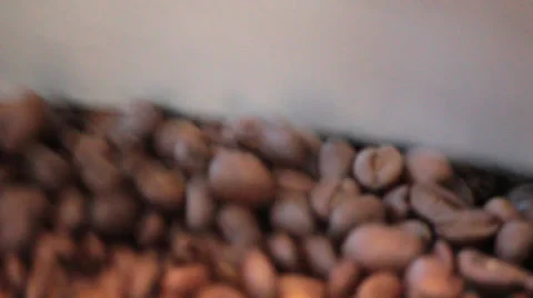 Java, closeup of lightly roasted coffee beans in cooling spin Stock Footage 37256473