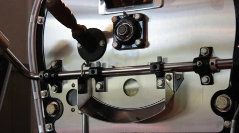 Java, green coffee beans in spinning in roaster  (HD) Stock Footage 37255756